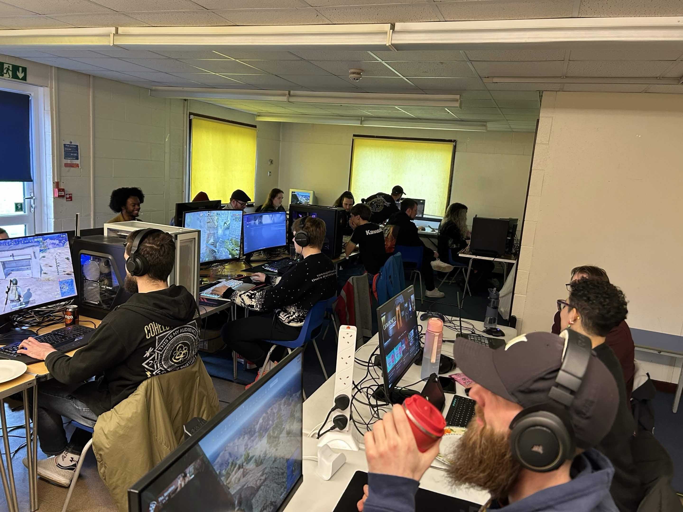 Gamers playing together at a Gamers Unite! LAN event